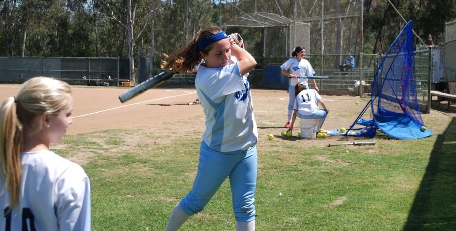 Senior Alexis Curtiss practices her swing.