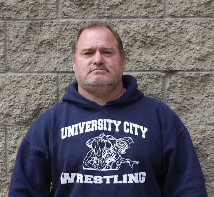 Coach of the Year Harrington Leads Wrestlers to Victory