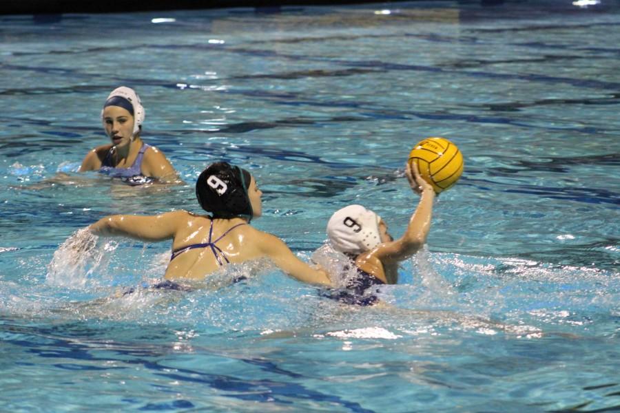 Sophomore Emily Heinz, Senior Jackie Sanders and Junior Clara Steinhauer (left to right) practice aggressively.