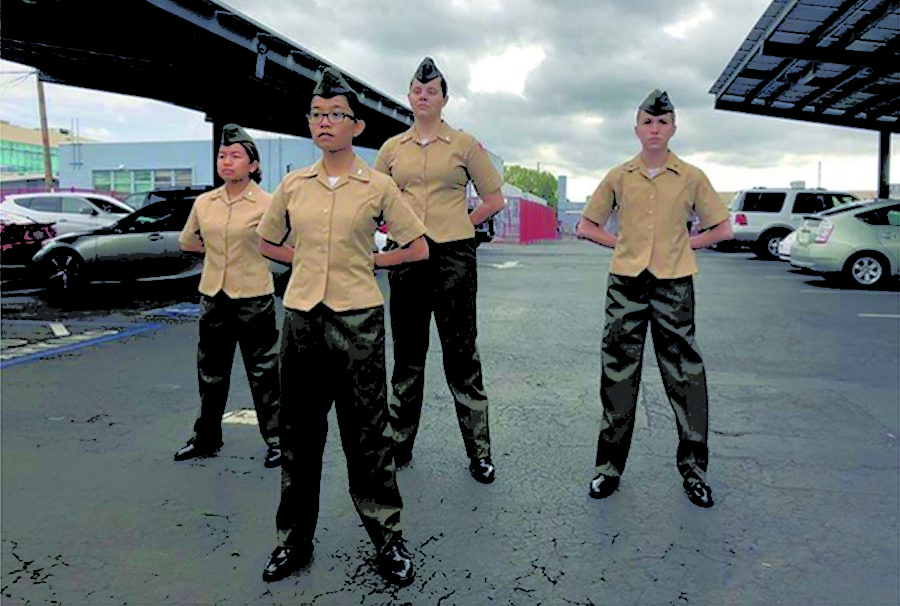 Sophomore Patricia Sourinphomy, Junior Natalia Trinh, Senior Rachel Bressler, Sophomore Rebecca Tanner (left to right) pose in their MCJROTC uniforms.