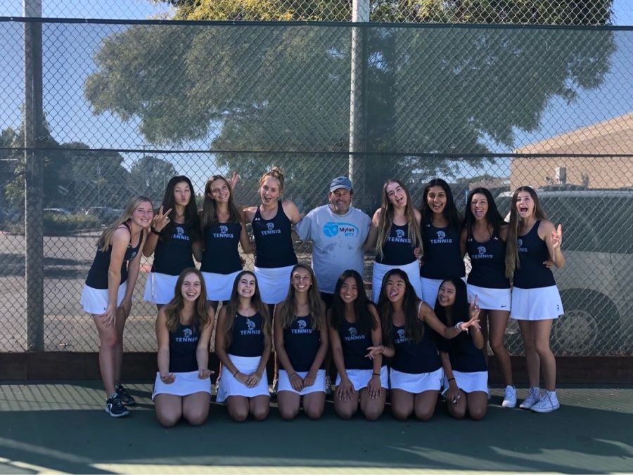 Last years Girls Tennis Team poses for a team picture.