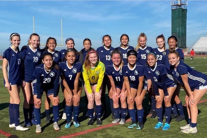 Last years Girls Varsity Soccer Team poses for a team picture.