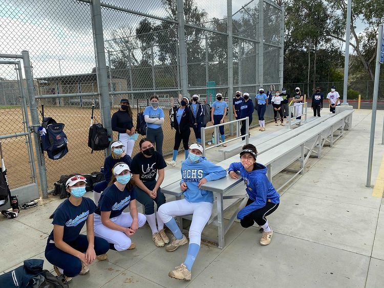 UC+High+softball+poses+for+a+picture+after+a+practice.