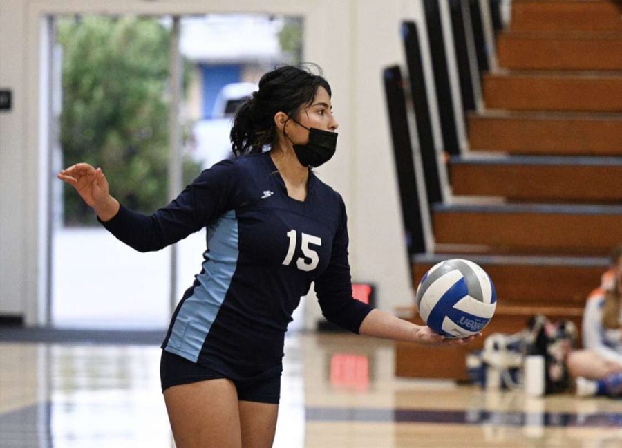 Senior Alexa Orozco sets up for a serve against Clairemont High in UC's 3-0 win on September 7.