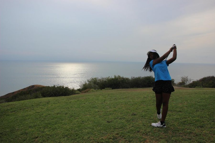 Freshman+Tinotenda+Feremenga+follows+through+on+her+shot+at+Torrey+Pines+Golf+Course.