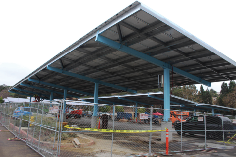 Construction in the student parking lot is to install new solar panels.