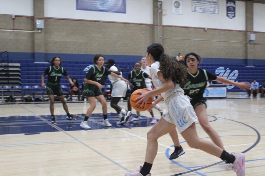 Senior Pohainani Basso attempting a shot at a game on Tuesday, December 6.