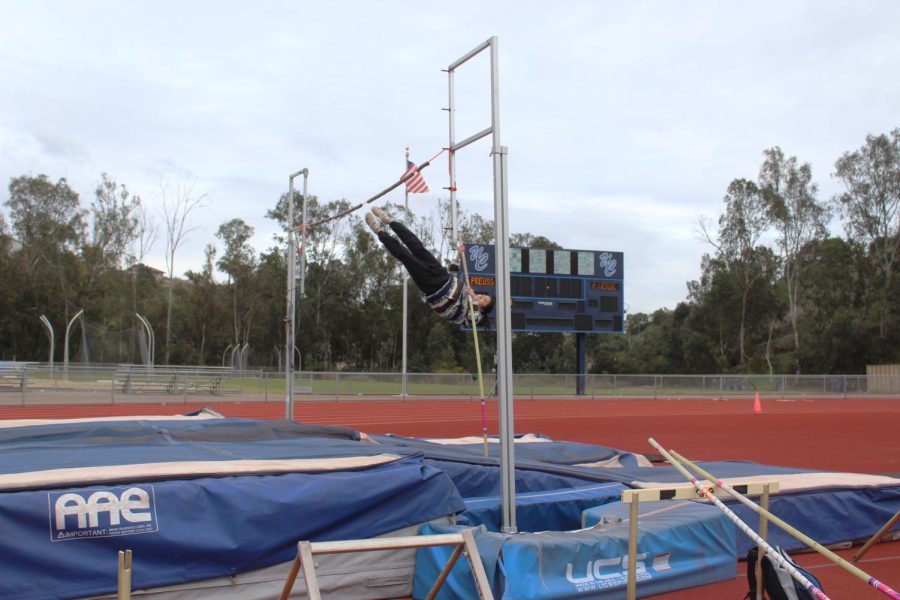 Senior Lauren Endaya jumping during pole vaulting practice.