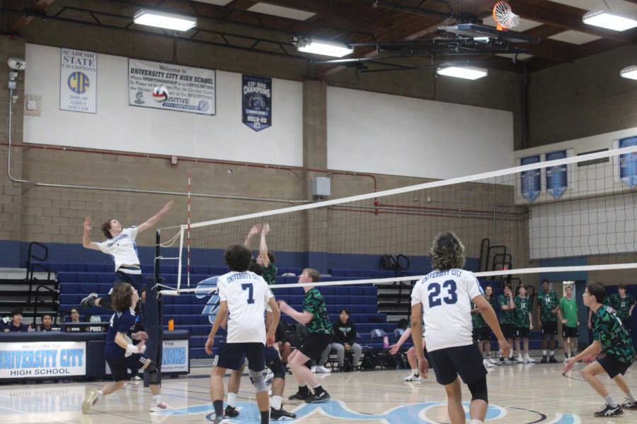 Senior Dash Martin spikes the ball at a game against Coronado.