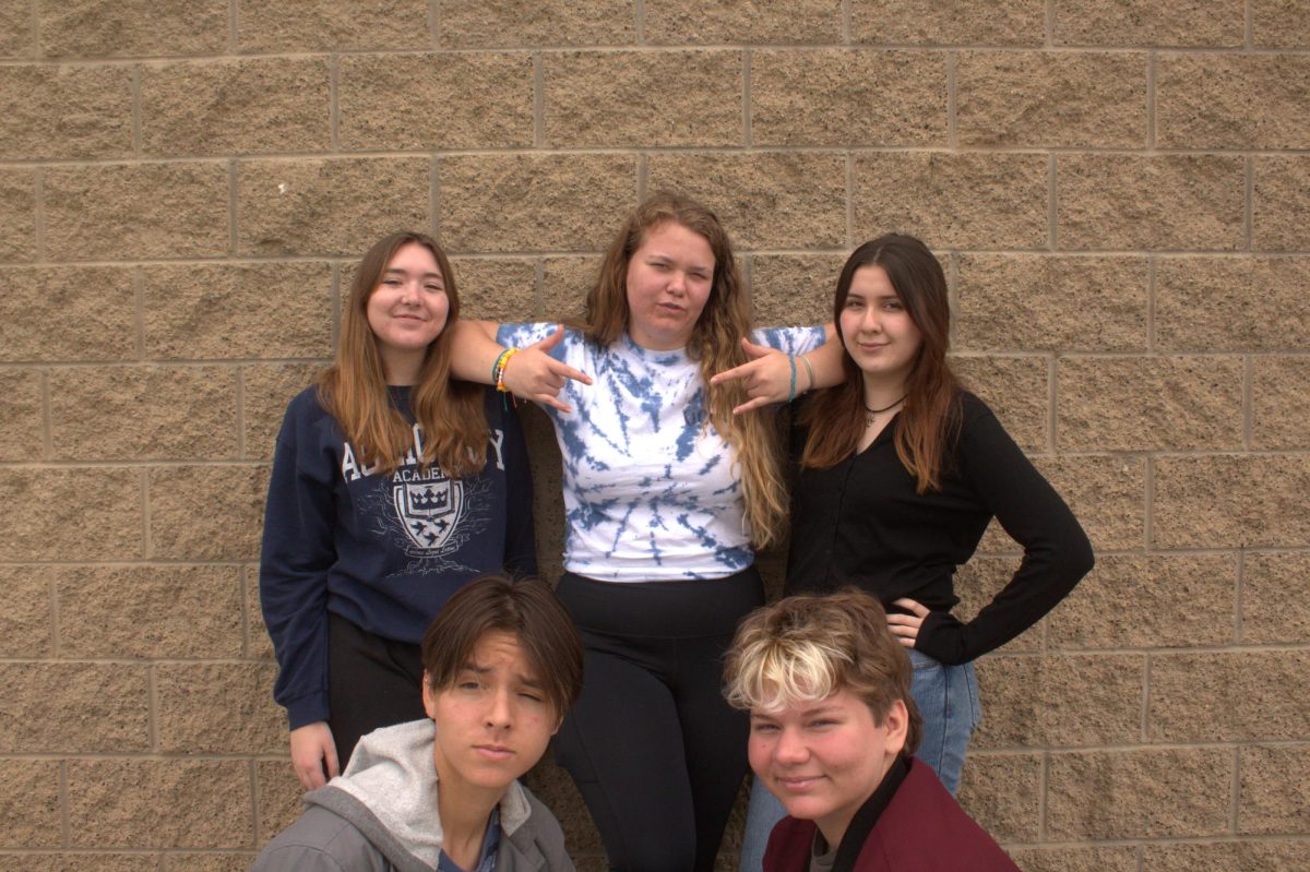 Senior Amelia Rains, Junior Maggie Prell, Junior Angela Hammett, Sophomore Robin Bernd, and Sophomore Ethan Hutchins  (left to right,  top to bottom) are all officers of UC High's GSA Club.