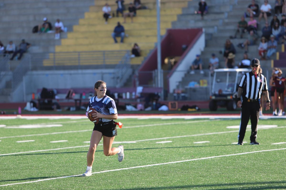 Quarterback Senior Bella Giron during a game