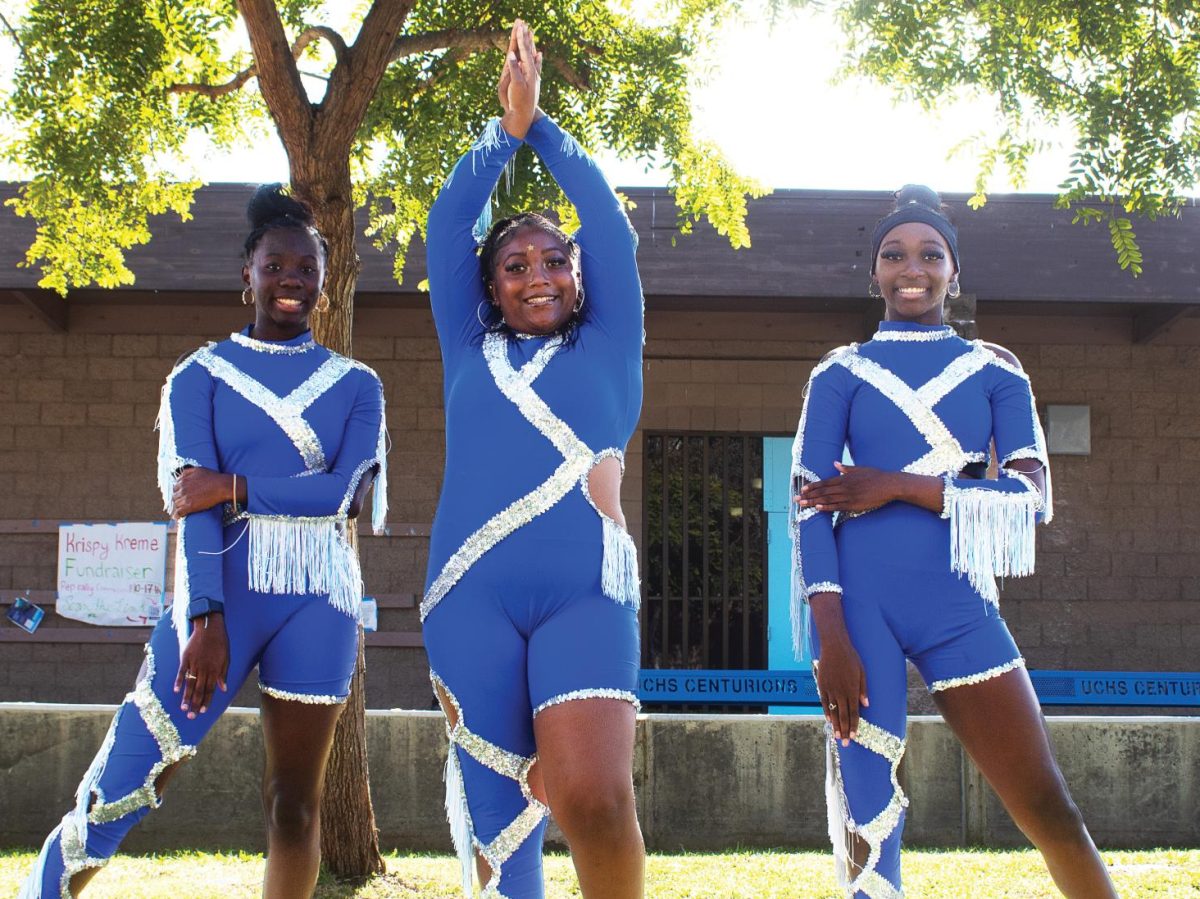 Freshman Taneeya Washington, Sophomore Alayjah Morgan and Freshman Keke Wasington pose.