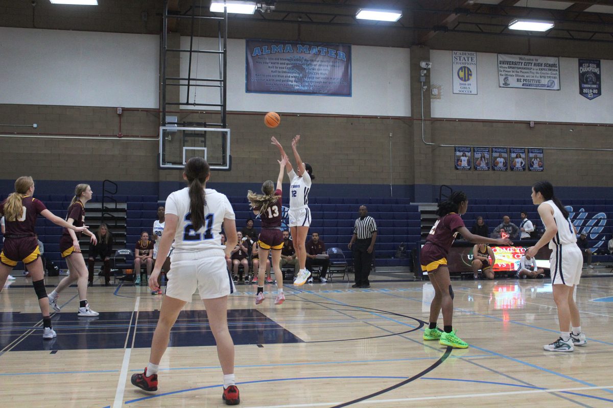 Senior Chaya Scott shooting a UC three at a game against Point Loma.