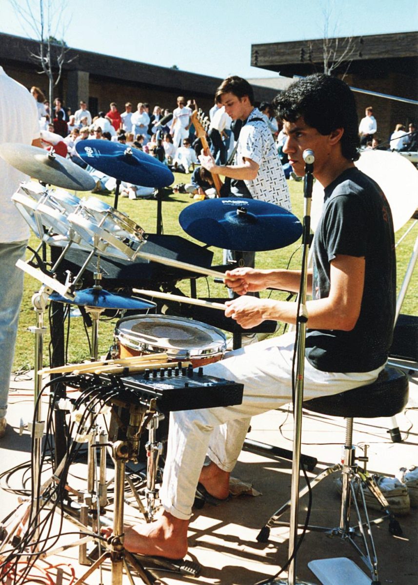 Tovar plays drums with his band in
the UC High Quad at lunch in 1987.