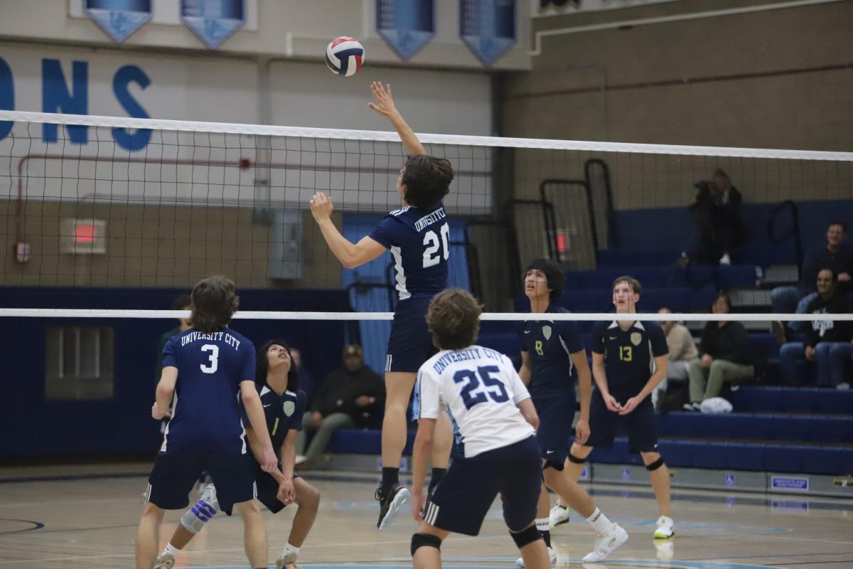 Senior Tommaso Panigada spiking the ball during a game against Bonita Vista.