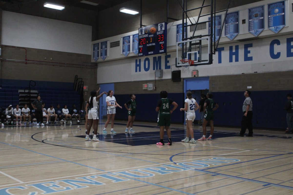 Freshman Joy Singleton  takes a shot during a game against Helix High School.