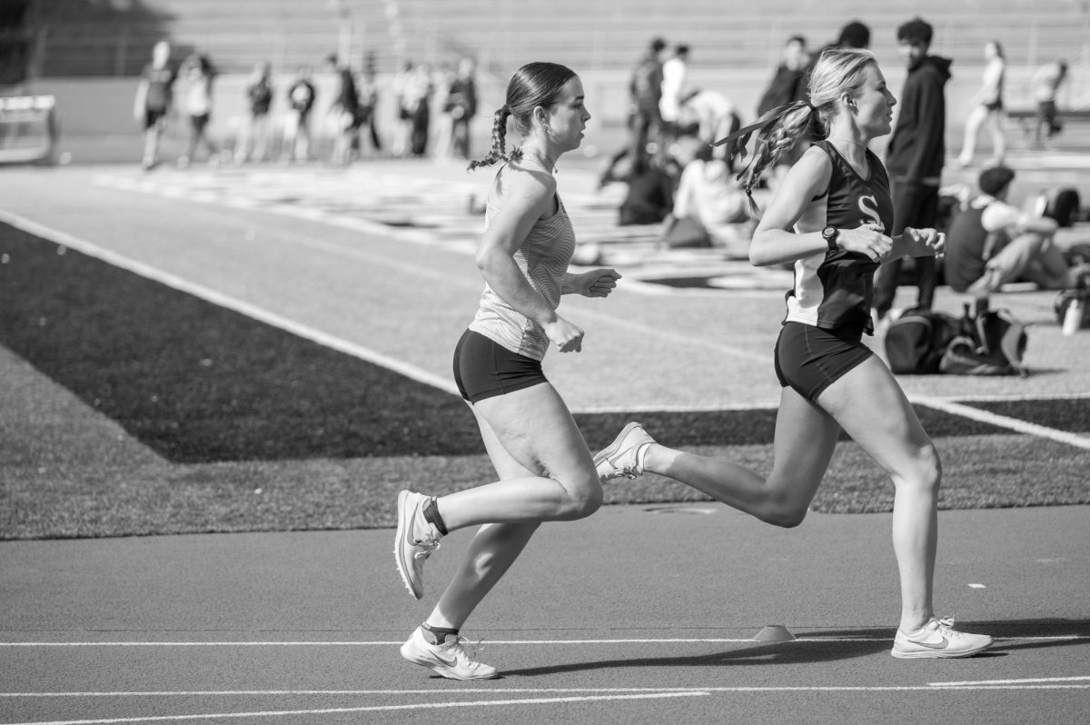 Last year's track and field star Alumna Darcy Ray sprinting her way to victory.